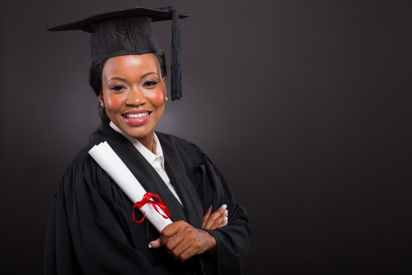 portrait of beautiful young african american graduate holding diploma